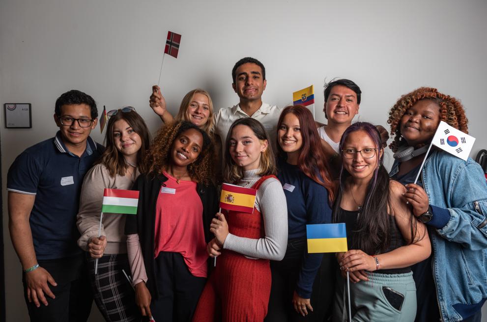 International students holding flags
